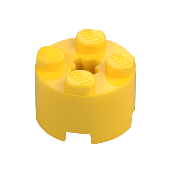 Yellow Brick Round 2x2 with Axle Hole - Used - $0.04